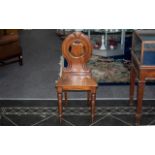 Victorian Mahogany Hall Chair with a Shaped Shield Back on Turned Legs.