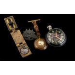 Military Smiths Magnetic Clock with a Black Dial, WIth an Australian Military Force Cap Badge,