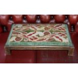 Tapestry Top Low Foot Stool raised on four square legs, with dark green and red tapestry top. 4''