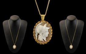 Ladies 9ct Gold Mounted Oval Shaped Shell Cameo Attached to a Long 9ct Gold Chain, Marked for 9ct