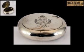 A Silver Squeeze Tobacco Box of typical oval/round form. Hallmarked for Birmingham E 1904.