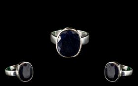 A Blue sapphire ring in 925 silver with 21ct stone plus a Citrine Ring with rose cut diamonds..