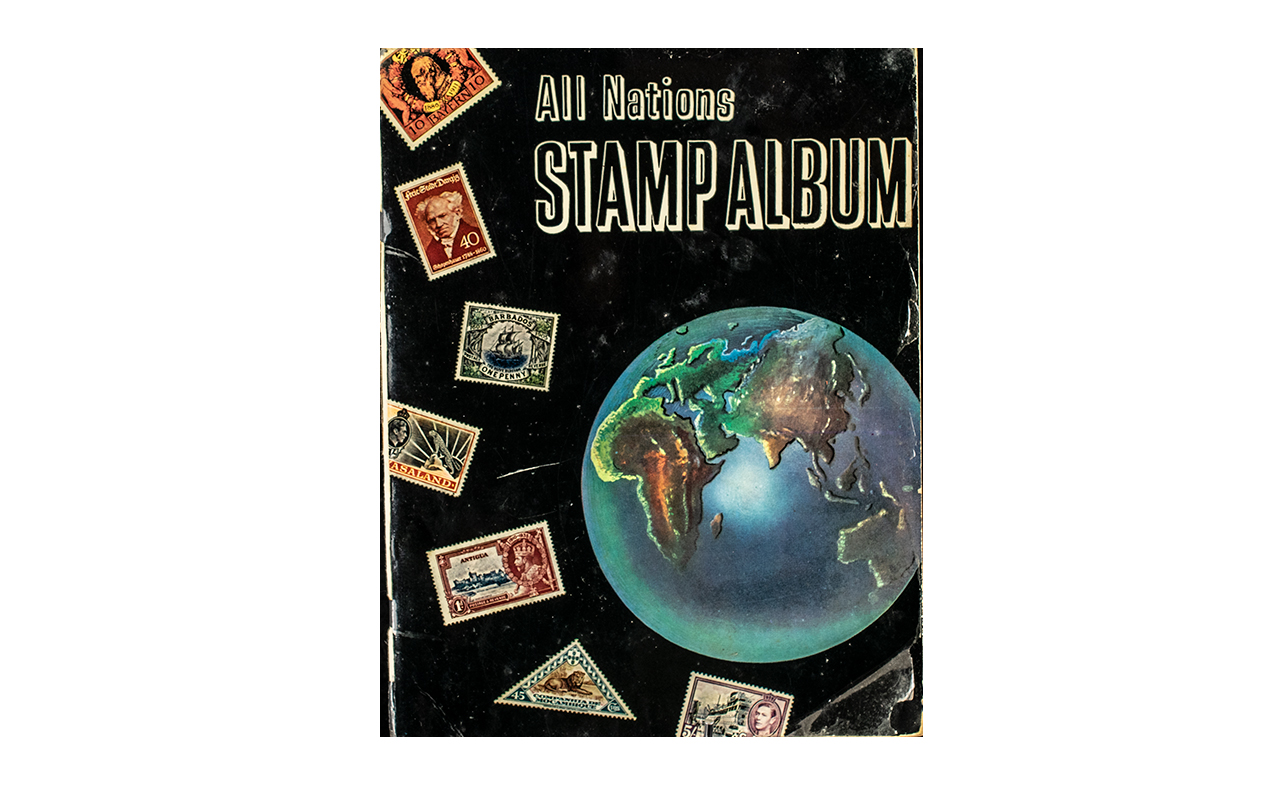 Collection of British Stamps housed in an All Nations Stamp Album,