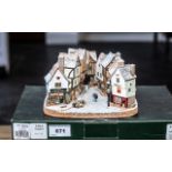 Limited Edition Lilliput Lane Light up Model 'Yuletide Shambles' limited edition number 0038,