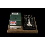 A Military Morse Code Tapper Model No. 1321000, Serial No. 8905920. Made in Britain. 7" Square.