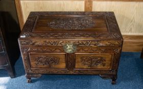 Carved Chinese Camphor Wood Chest of traditional form, with a brass lock plate. Circa 1930s.