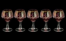 Cranberry Glass - Suite of Five Brandy Glasses, engraved, measure 5" tall, made in Czechoslovakia.