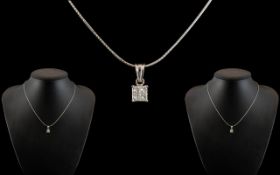 18ct White Gold Diamond Set Pendant, set with four princess cut diamonds,