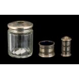 Silver Topped Glass Hair Tidy with a Silver Mustard Pot and Salt Sifter. Please See Photo.