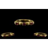 14ct Gold Attractive 3 Stone Ruby Set Ring. Marked to Interior of Shank 585.