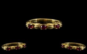 14ct Gold Attractive 3 Stone Ruby Set Ring. Marked to Interior of Shank 585.