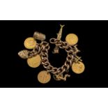 Edwardian Period - 9ct Gold Ornate Curb Bracelet Loaded with 9ct Gold Charms ( 7 ) and 22ct Gold