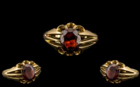 9ct Gold - Pleasing Single Stone Fire Garnet Set Dress Ring, In a Gypsy Setting.