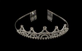 White Austrian Crystal and Faux Diamond Tiara, a classic design of arches and loops encrusted with