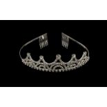 White Austrian Crystal and Faux Diamond Tiara, a classic design of arches and loops encrusted with
