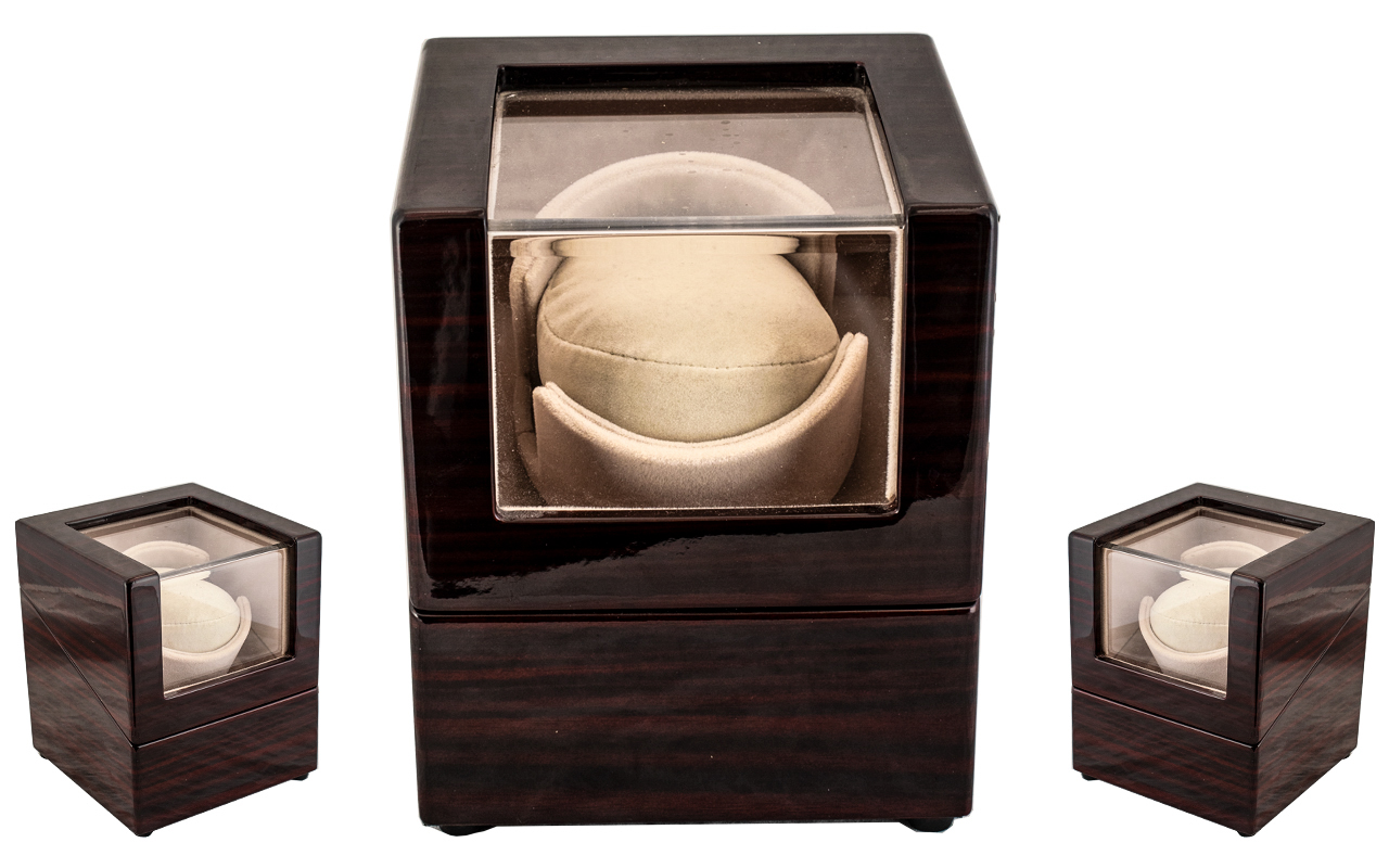 A Chiyoda Watch Winder mint condition 6.3 inches high. Please see accompanying image.