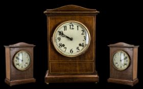 An Early 20th Century Mahogany Newhaven Mantel Clock height 12 inches.