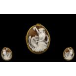 A Victorian Carved Shell Cameo depicting Goddess Hebe feeding Zeus (in the form of eagle).