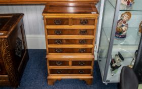 A Small Yewood Chest Comprising of 2 Short Over 3 Long Drawers. Above 2 Short and One Long Drawer.