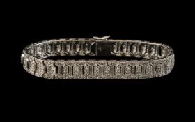 A 9ct Gold Diamond Bracelet set with rou