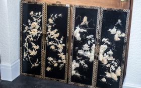 Set of Four Black Lacquered Chinese Wall