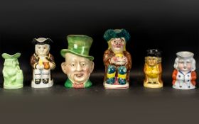 Collection of Six Toby Jugs, comprising: