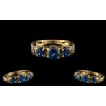 Ladies Attractive 9ct Gold Sapphire and Diamond Set Dress Ring. Marked 9ct to Interior of Shank.