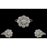 Platinum - Superb Quality Diamond Set Ladies Ring - Flower head Design. Marked Platinum to