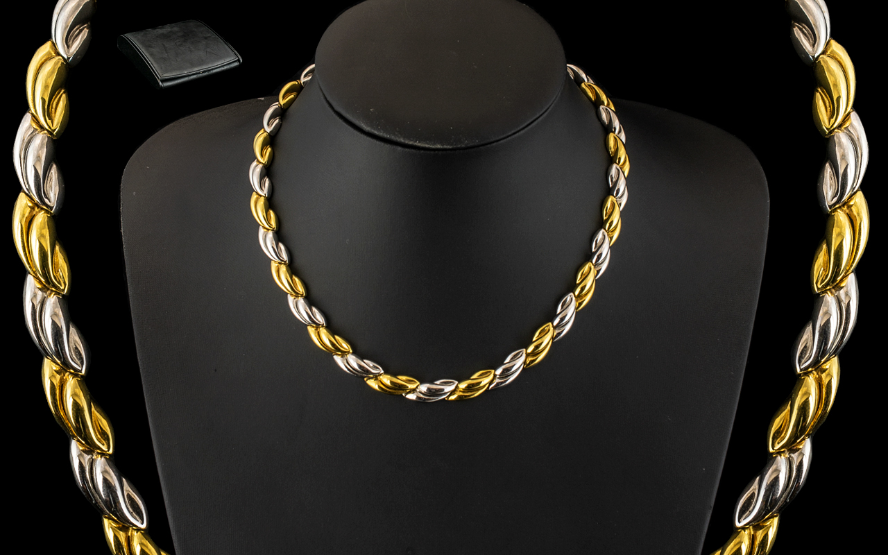 A Stunning Italian 18ct Two Tone Gold Necklace In An Attractive Design with Concealed Clasp.