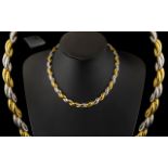 A Stunning Italian 18ct Two Tone Gold Necklace In An Attractive Design with Concealed Clasp.