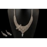 White Crystal Asymmetric Necklace and Matching Earrings,