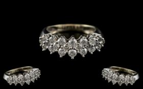 10ct White Gold - Attractive Diamond Set Dress Ring of Contemporary Design.