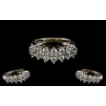 10ct White Gold - Attractive Diamond Set Dress Ring of Contemporary Design.