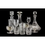 Three Various Cut Glass Decanters with stoppers, cut glass sundae dishes,
