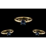 A 14ct Gold Single Stone Sapphire Ring - fully hallmarked. Ring size M.