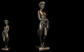 Large Bronzed Figure of a Semi Clad Woman in a classical pose,