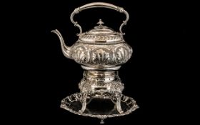 Victorian Embossed Metal Spirit Kettle, raised on a stand.