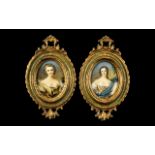 Pair of Miniatures Painted on Ivory of Elegant Ladies, finely dressed in silks,