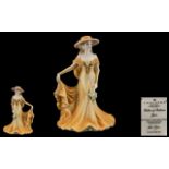 Coalport - Fine Bone China Exclusive Hand Painted Figurine ' Ladies of Fashion ' June '.