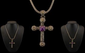 Large Silver and Gold Cross Set With an Amethyst Stone to the Centre.