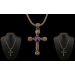 Large Silver and Gold Cross Set With an Amethyst Stone to the Centre.