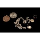 Silver Charm Bracelet with seven charms, a 1900 Victorian silver crown,