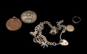 Silver Charm Bracelet with seven charms, a 1900 Victorian silver crown,