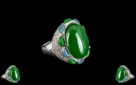 Green and Blue Jade Statement Ring, an oval cut green jade cabochon of 22cts,