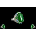 Green and Blue Jade Statement Ring, an oval cut green jade cabochon of 22cts,