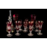 Collection of Ruby Coloured Glass, comprising a bell, four sherry glasses, five liqueur glasses,