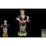 Duesbury Derby Figure of a Lady Playing a Musical Instrument, finely decorated, on an encrusted,