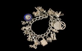 Sterling Silver - Vintage Charm Bracelet Loaded with 20 Charms.