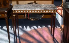 A French Marble Top Reproduction Console Table with ormolu mounted porcelain plaques applied to the