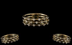 18ct Gold - Contempory Designed Diamond Set Ring.